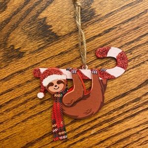 Six Flags Holiday in the Park Sloth Hanging From Candy Cane Xmas Ornament